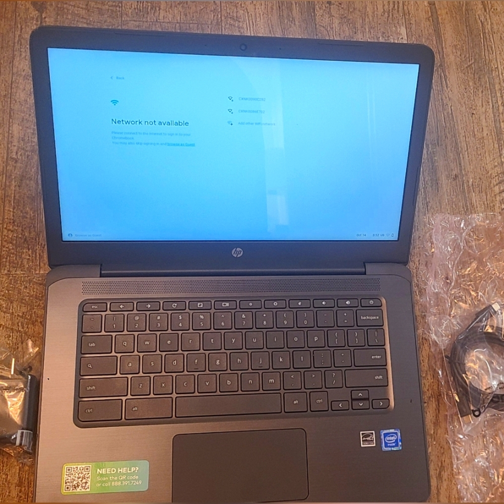 HP Chromebook with charger and block